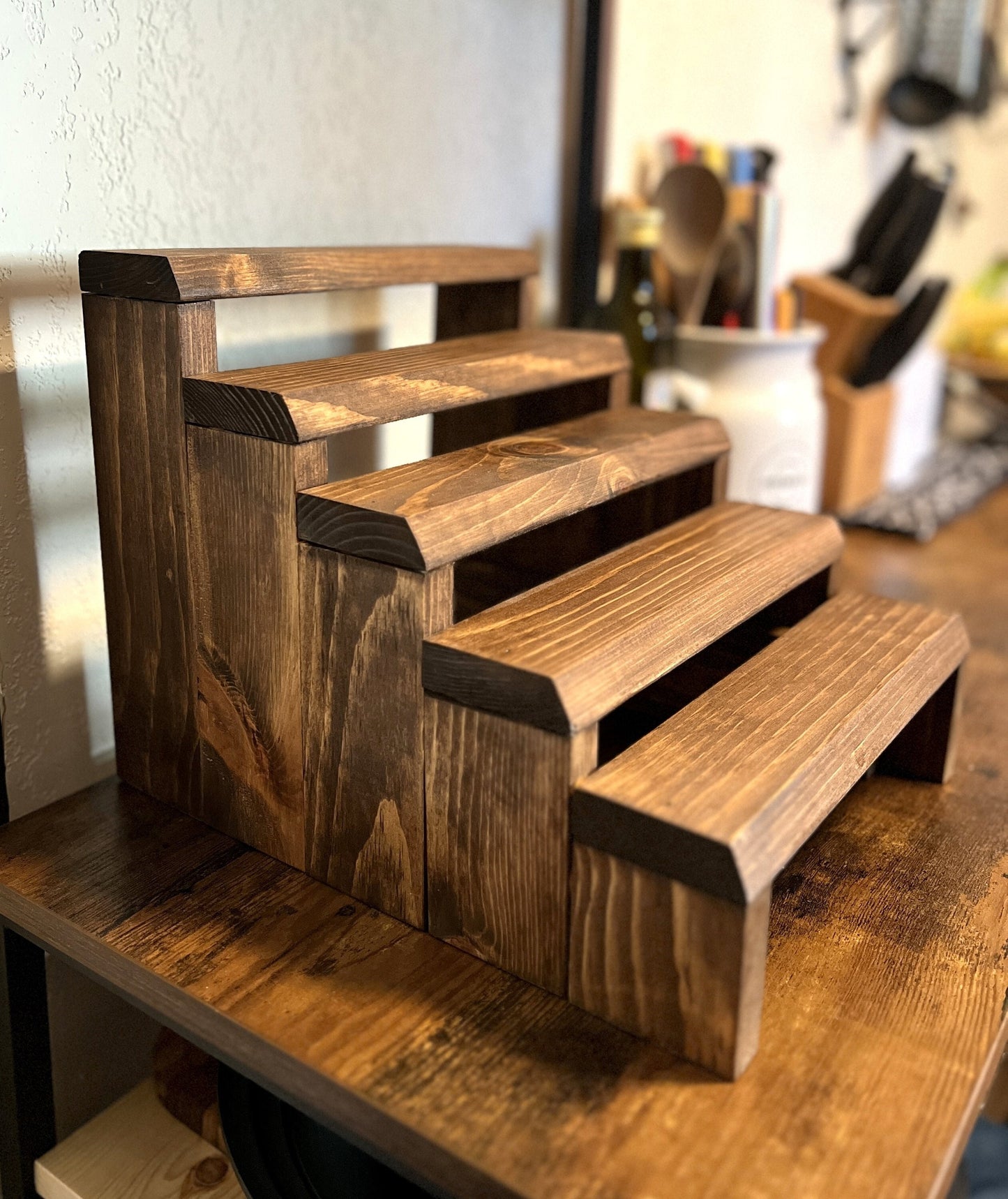 Solid pine wood tiered spice rack display stand for countertop.
