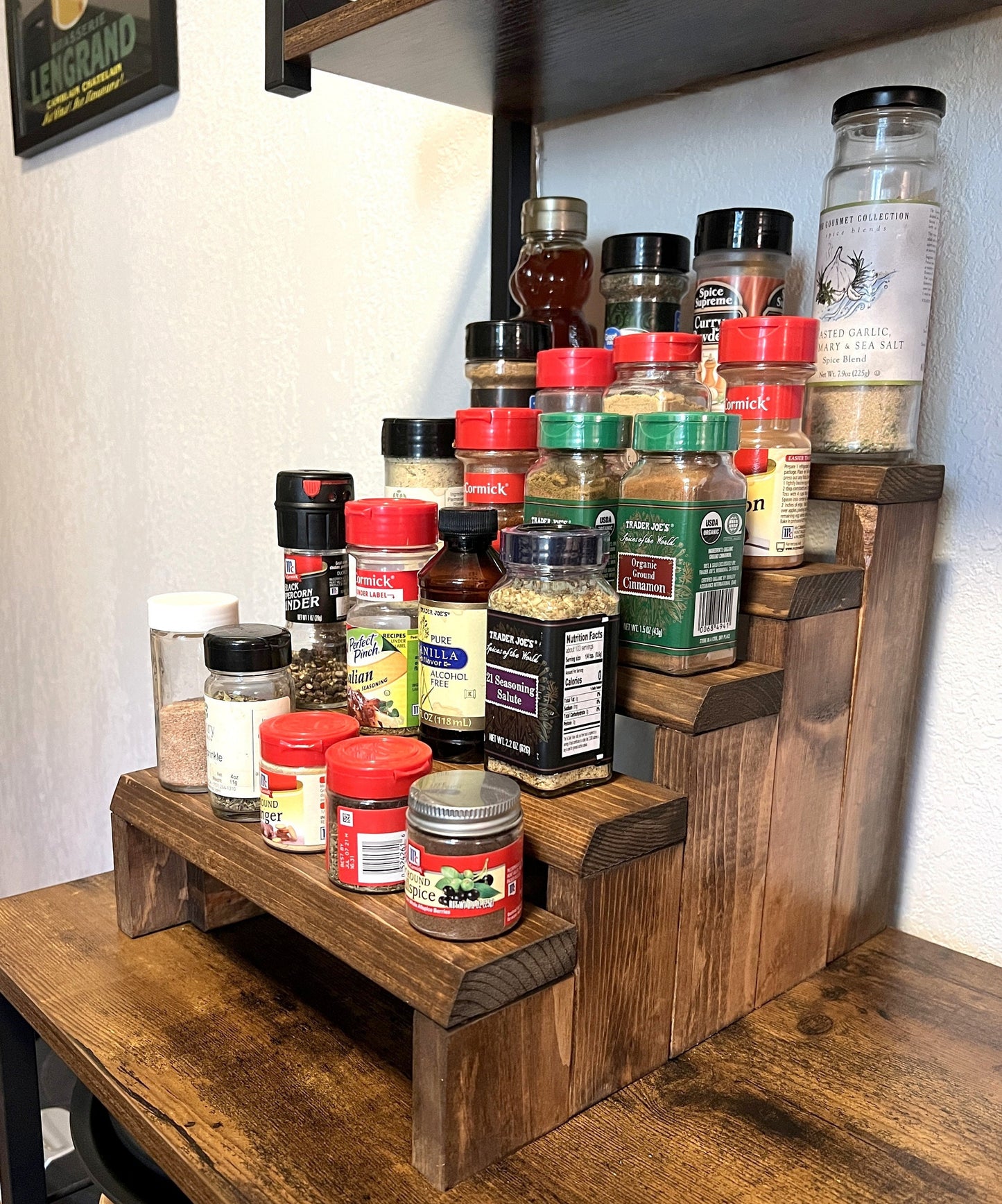 Solid pine wood tiered spice rack display stand for countertop.