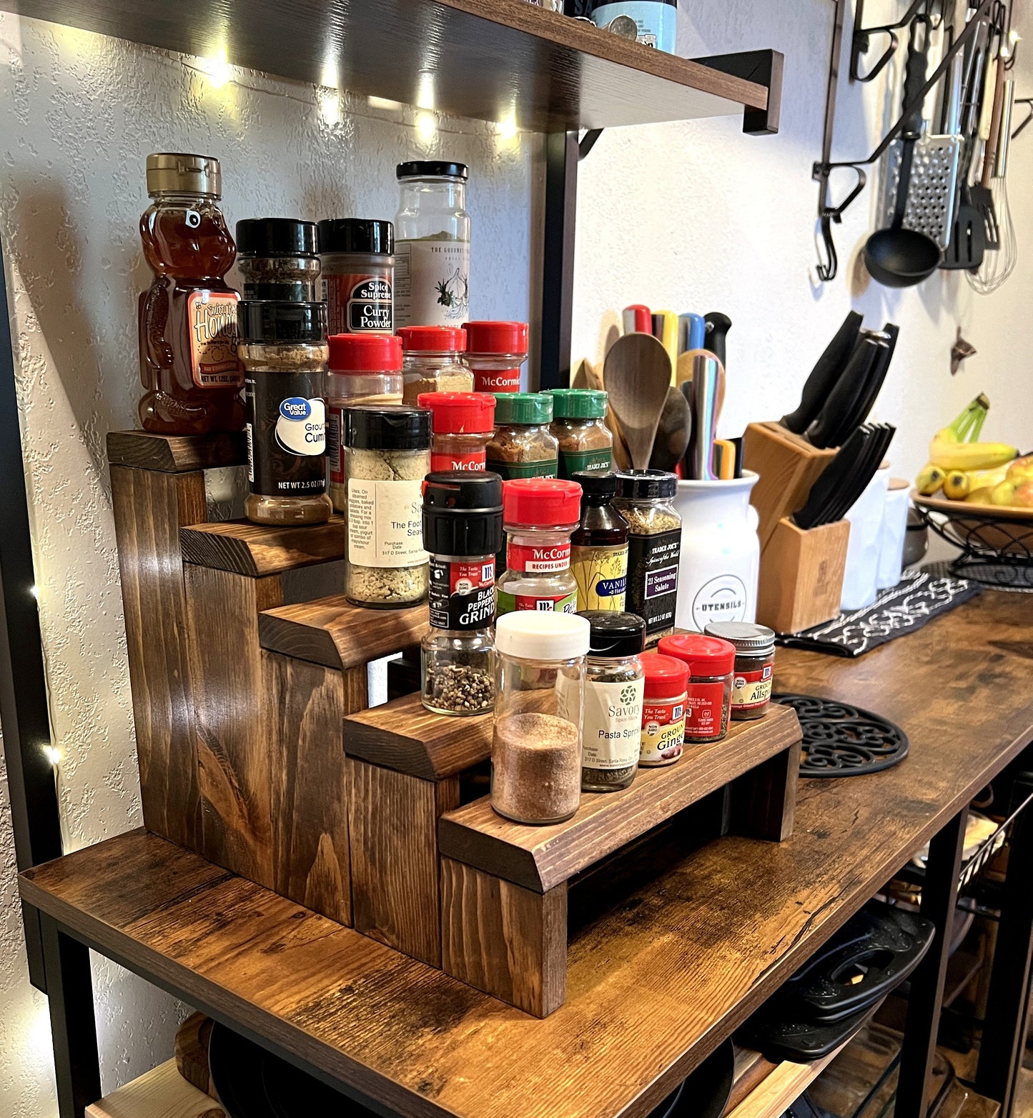 Solid pine wood tiered spice rack display stand for countertop.