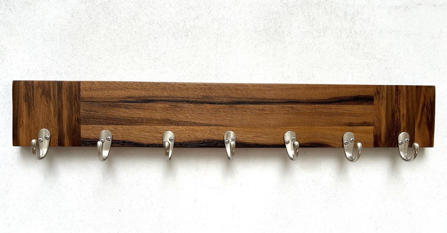 Walnut entryway organizer, dog leash hanger.