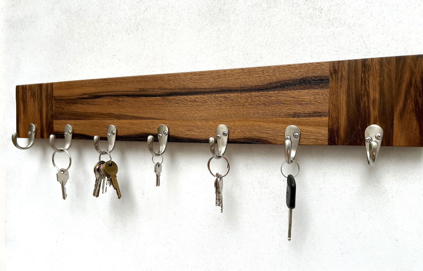 Walnut entryway organizer, dog leash hanger.