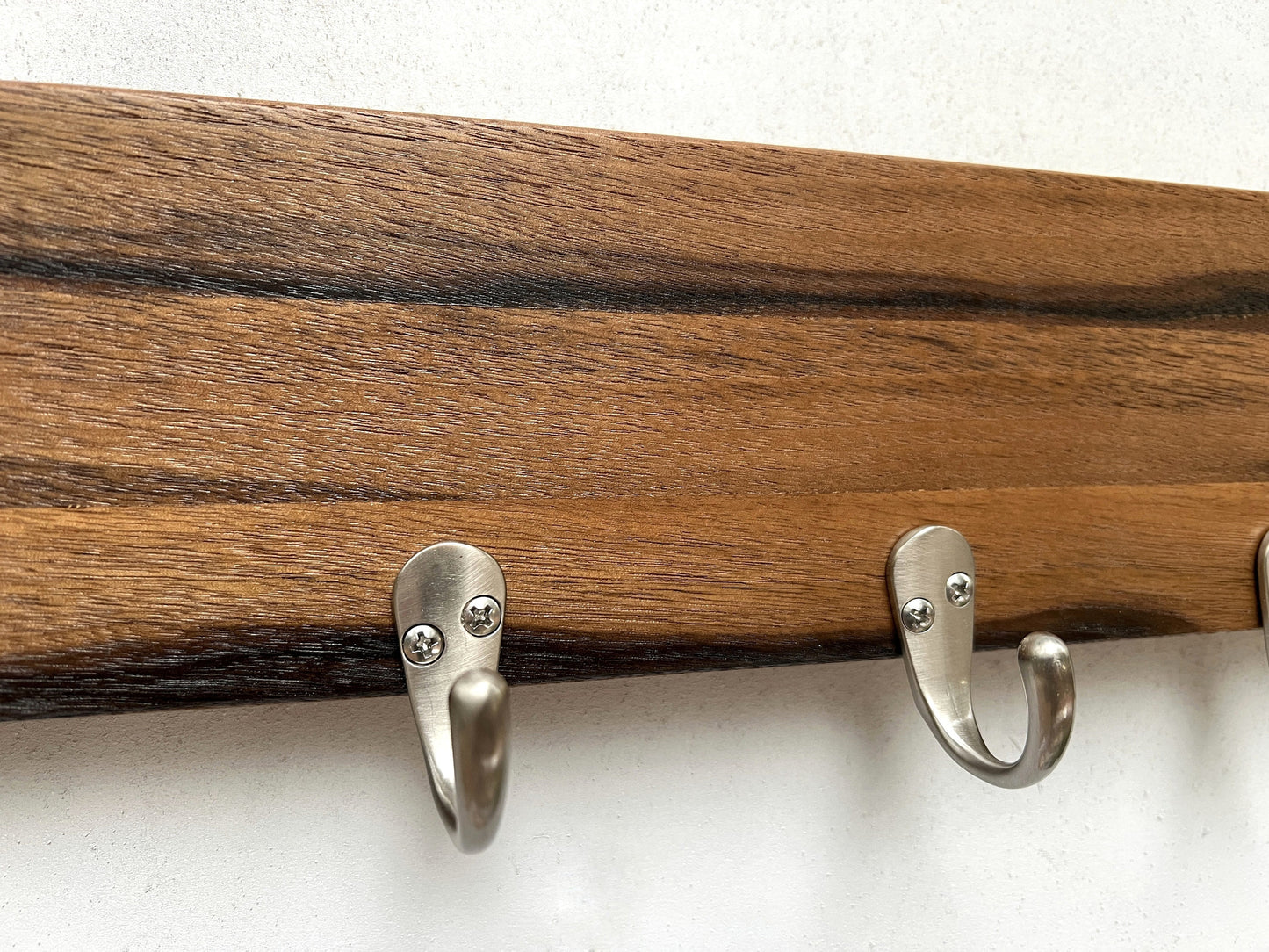 Walnut entryway organizer, dog leash hanger.