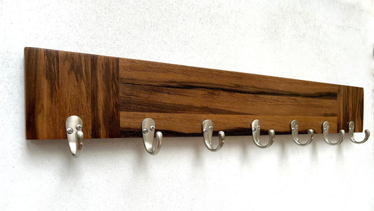 Walnut entryway organizer, dog leash hanger.